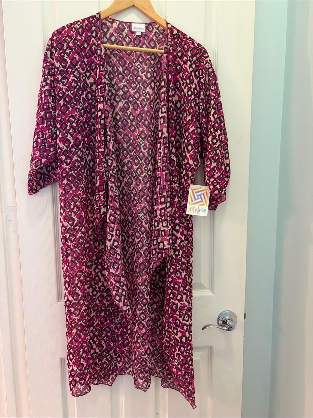 LuLaRoe Pink and Brown Geometric Animal Print Top